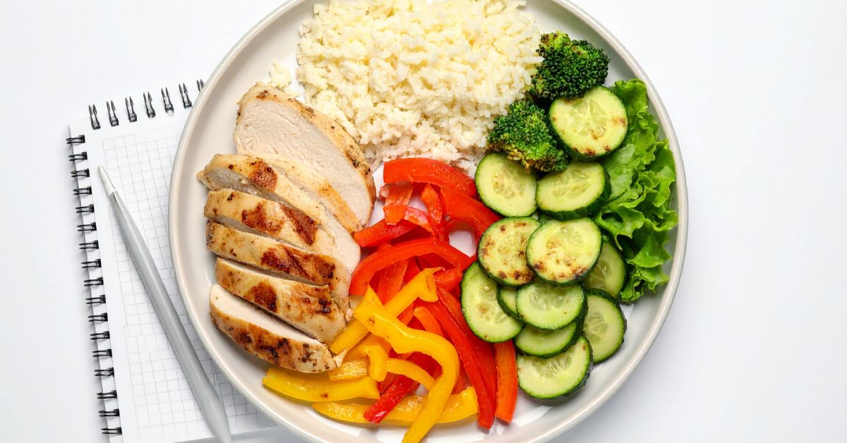 balanced-lunch-blood-sugar-stressfreelongevity.jpg Balanced lunch with chicken, vegetables and rice
