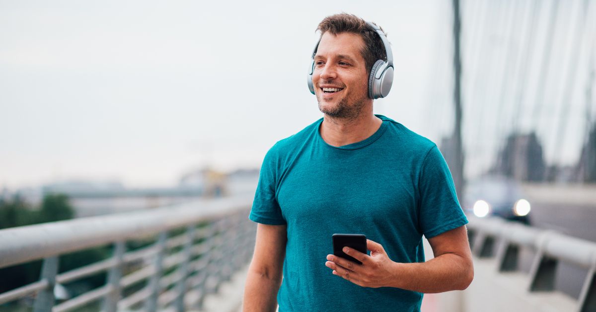 Walking outdoors while listening to music or podcast