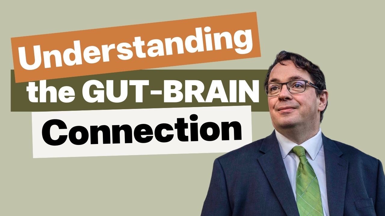Prof. John Cryan looking to the left, with episode title Understanding the Gut Brain Connection
