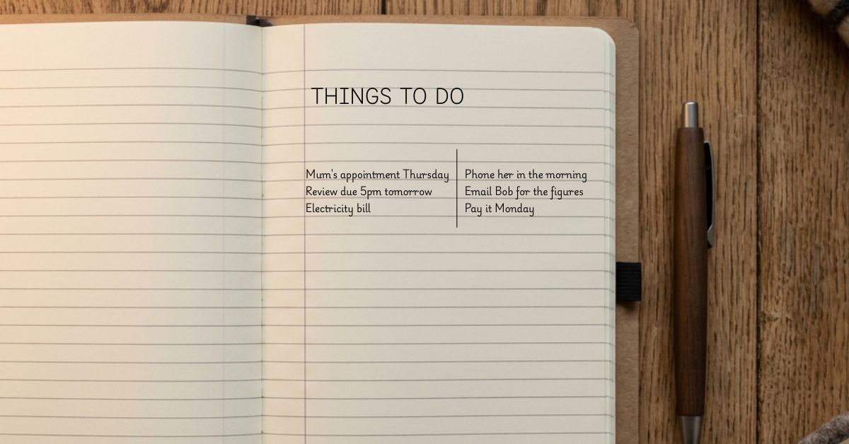 Open notebook listing worries on the left and the next action for each on the right